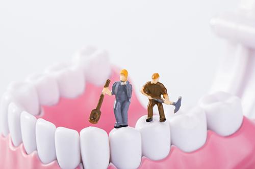 牙缝黑了是什么原因